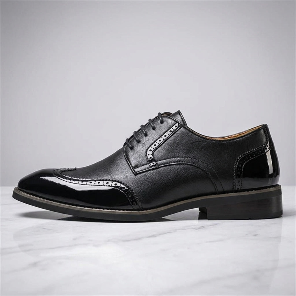 Tortona Leather Wingtip Brogues — Black, side profile studio view