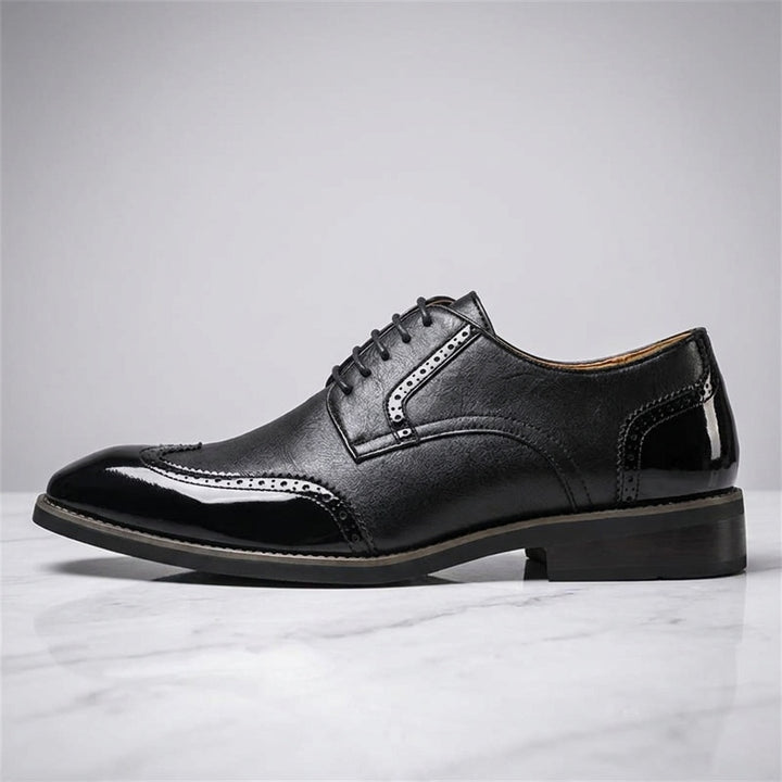 Tortona Leather Wingtip Brogues — Black, side profile studio view