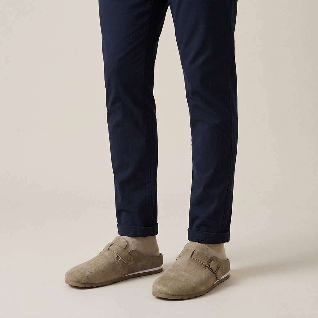 Volterra Suede Mules — Sand, worn on model, studio