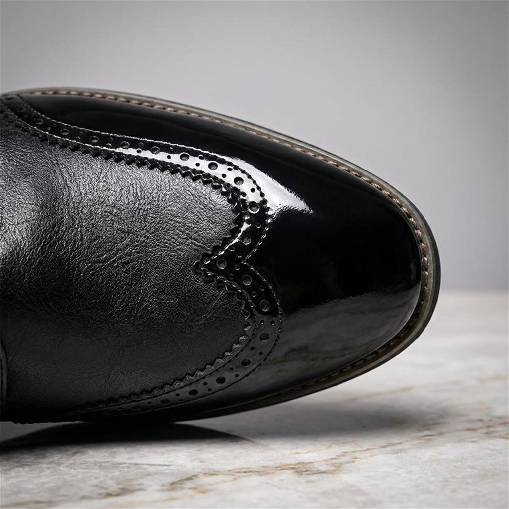 Tortona Leather Wingtip Brogues — Black, close view of the gloss and matte seam