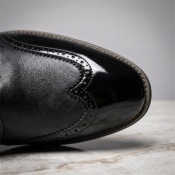 Tortona Leather Wingtip Brogues — Black, close view of the gloss and matte seam
