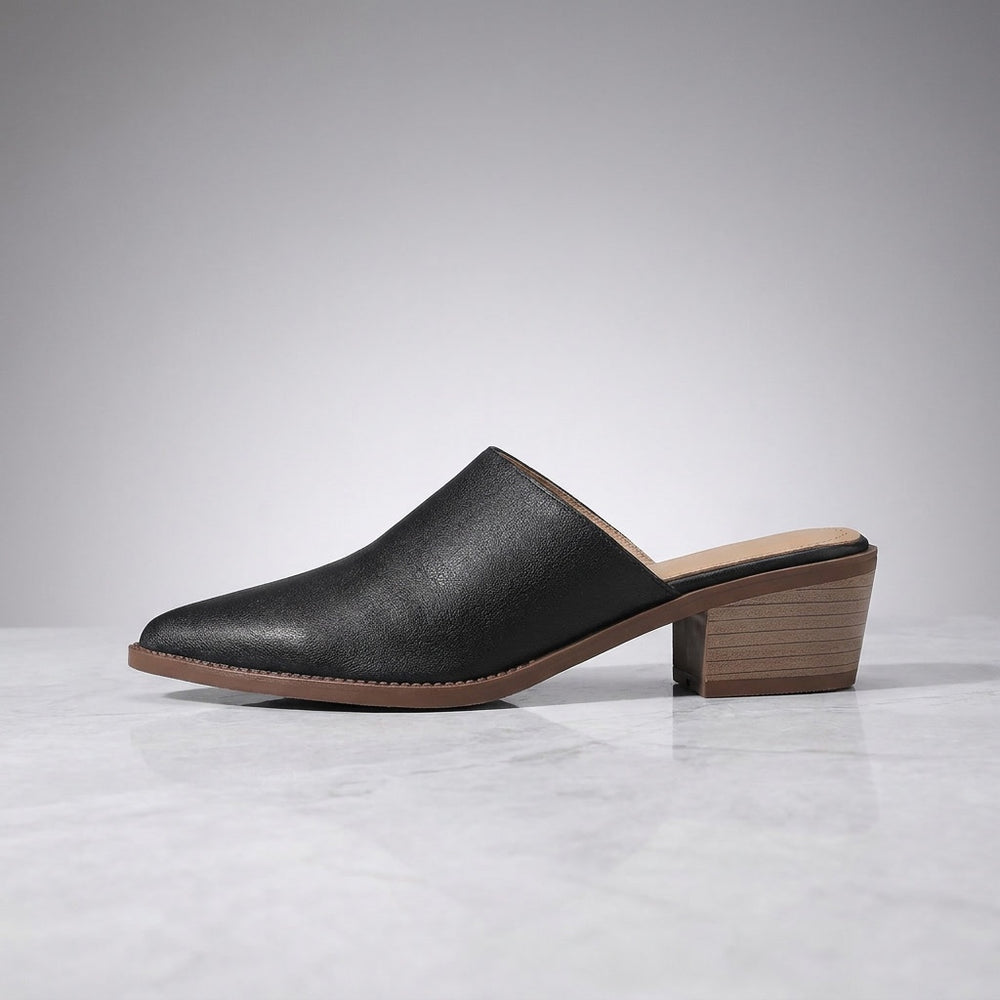 Lucera Leather Mules — Black, side profile studio view