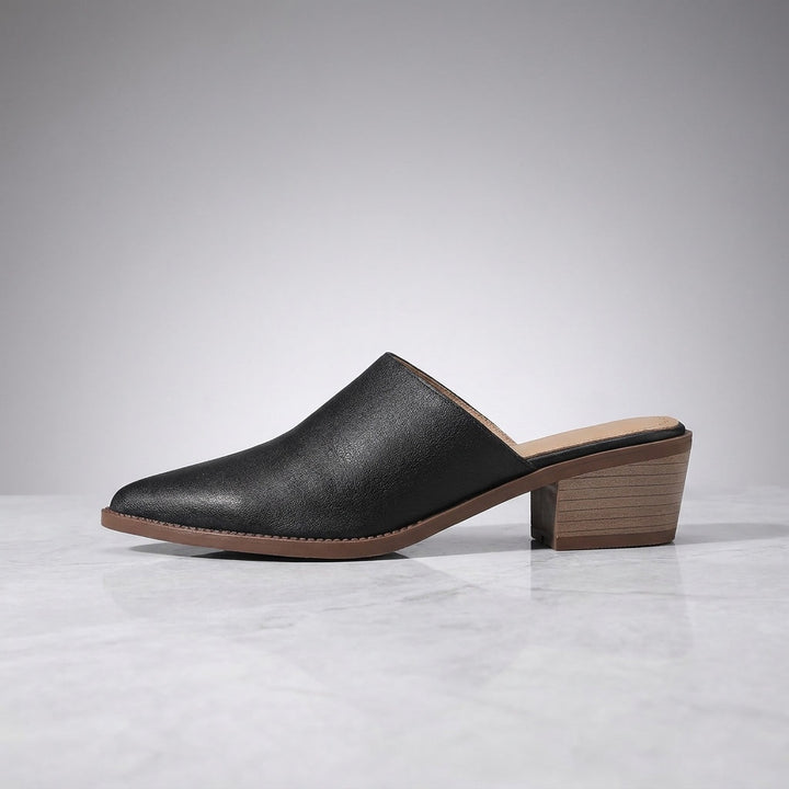 Lucera Leather Mules — Black, side profile studio view