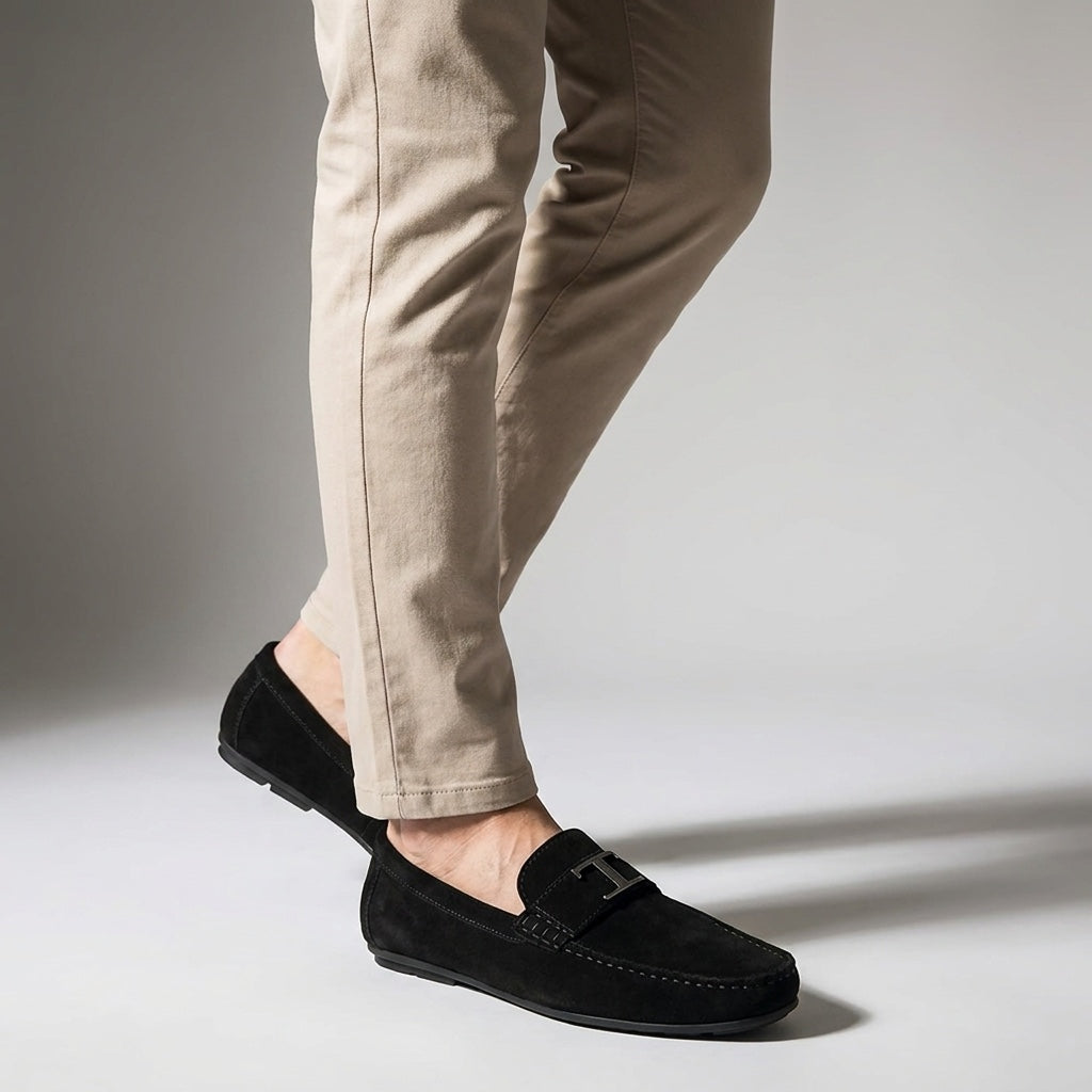 Zoagli Suede Loafers — Black, male model knee-down studio