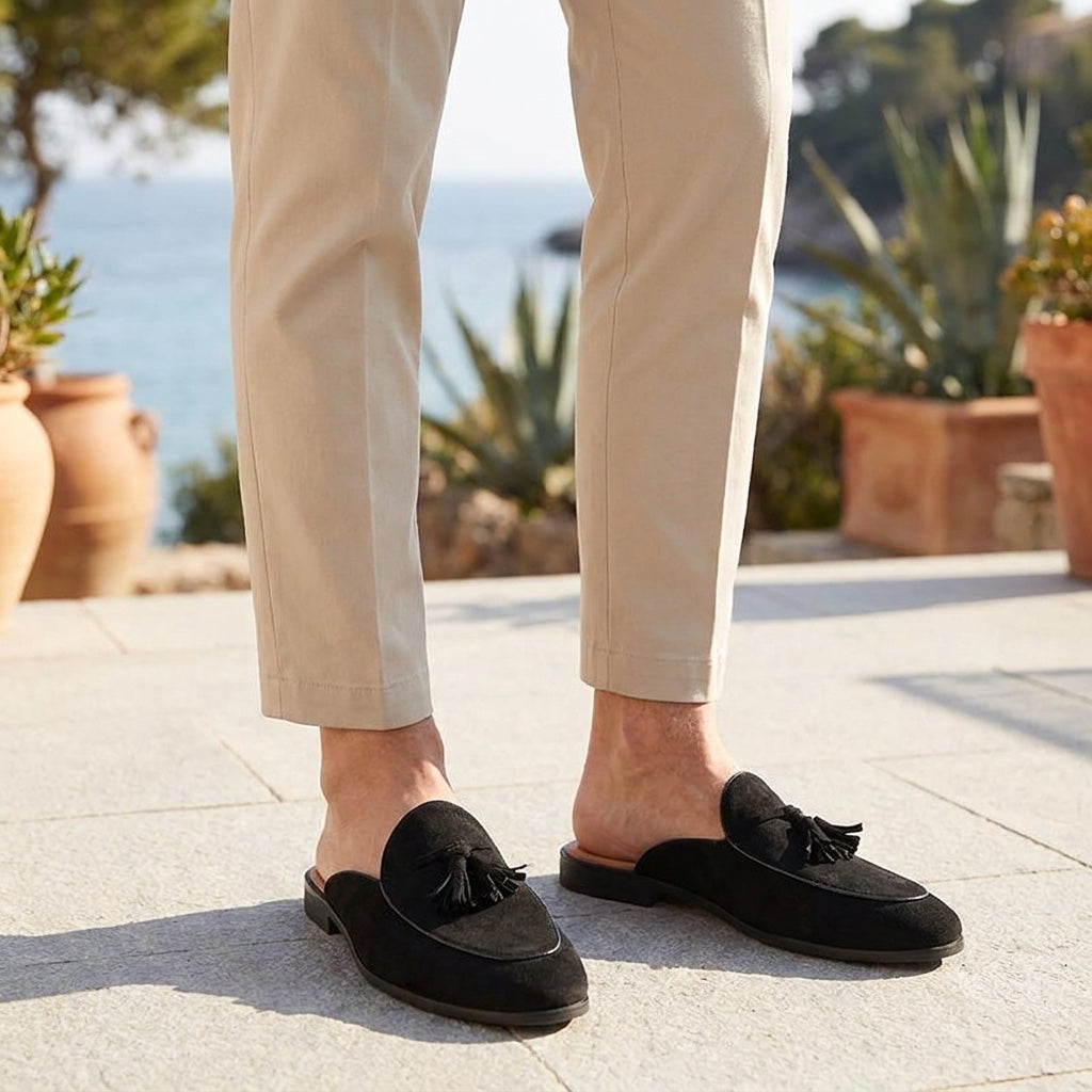 Vasto Suede Mules — Black, male model knee-down coastal terrace