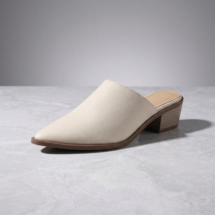 Lucera Leather Mules — Cream, three-quarter studio view