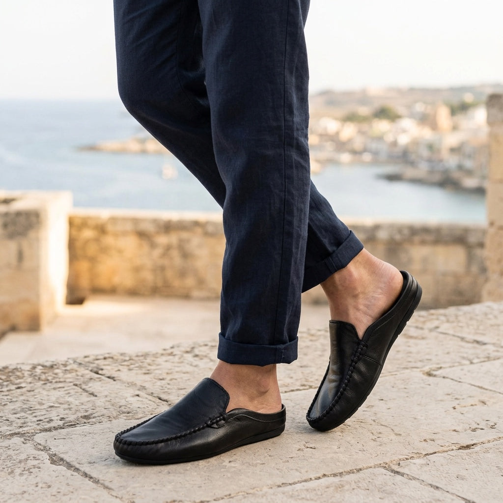 Vietri Leather Mules — Black, coastal terrace lifestyle