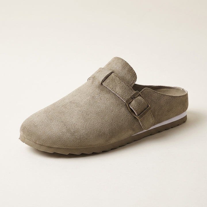 Volterra Suede Mules — Sand, three-quarter studio view