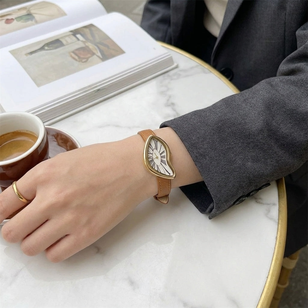 Basel Twisted Watch — Tan, worn at a cafe table