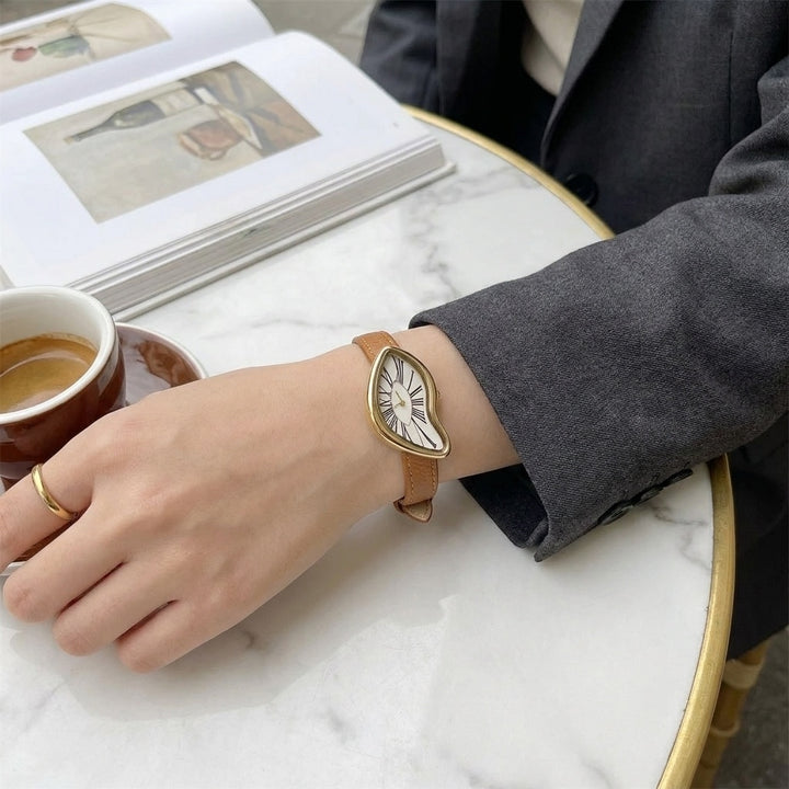 Basel Twisted Watch — Tan, worn at a cafe table