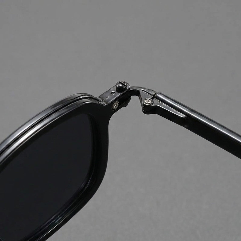 Catania Metal Sunglasses — Black, frame corner detail