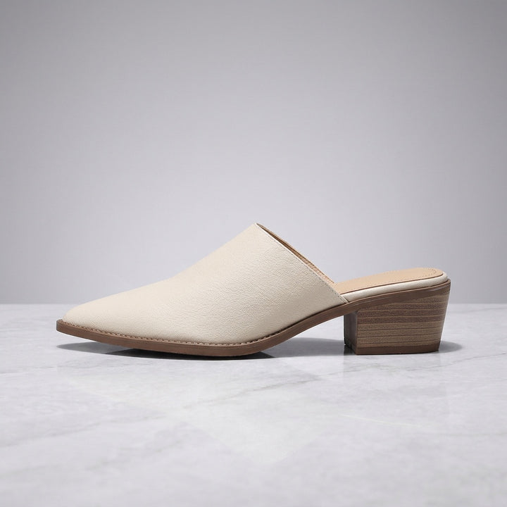 Lucera Leather Mules — Cream, side profile studio view