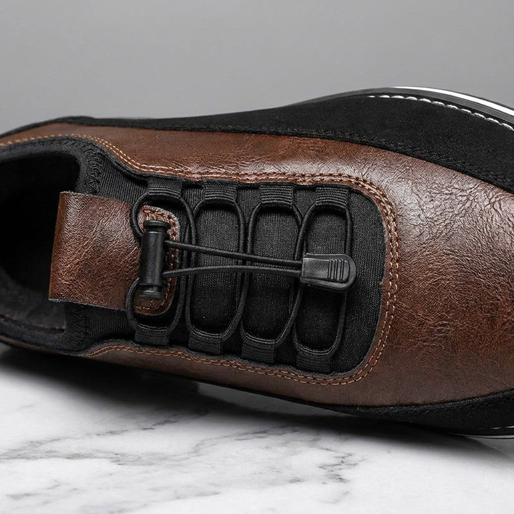 Anagni No-Tie Dress Shoes — Chestnut Brown, close-up of the elastic no-tie laces and stitched upper on light-grey marble