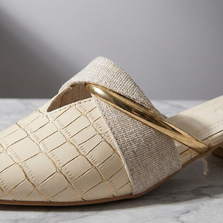 Tivoli Croc-Embossed Mules — Beige, construction close-up