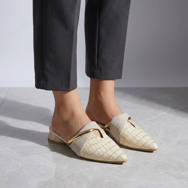 Tivoli Croc-Embossed Mules — Beige, on model knee-down studio