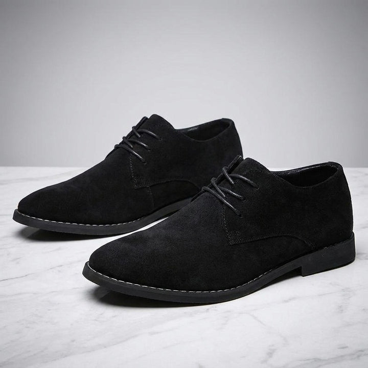 Bari Suede Oxfords — Black, pair on marble