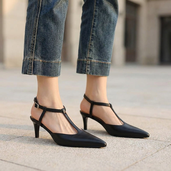 Genoa Pointed Sandals — Black, on model urban stone plaza
