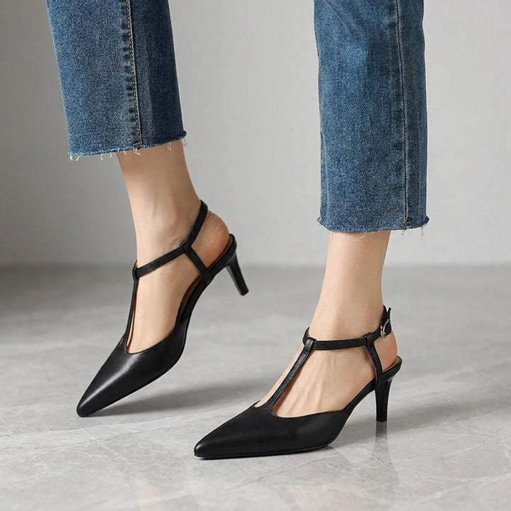 Genoa Pointed Sandals — Black, on model knee-down studio