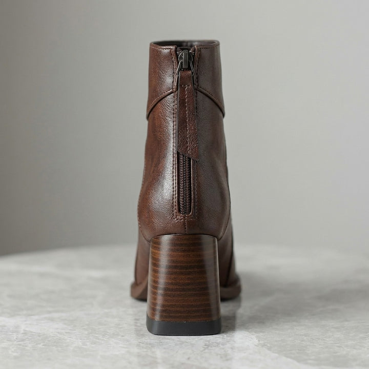 Bormio Paneled Ankle Boots — Brown, close-up from behind of the centered back zip and stacked block heel