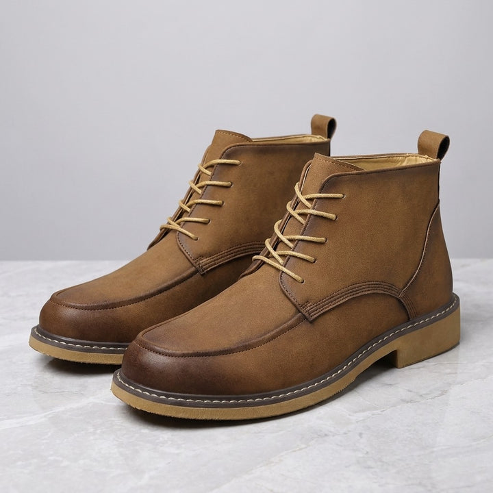 Belluno Leather Boots — Brown, pair on marble