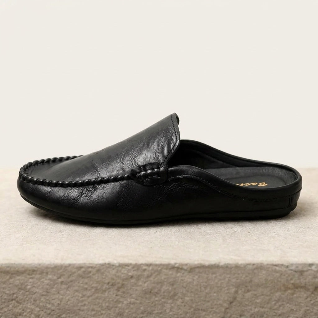 Vietri Leather Mules — Black, side profile studio view