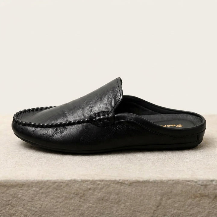 Vietri Leather Mules — Black, side profile studio view