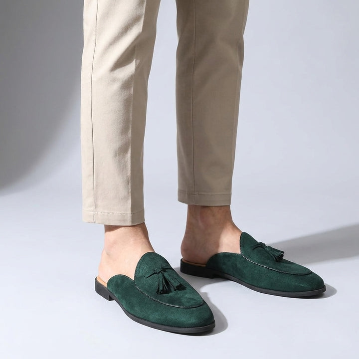 Vasto Suede Mules — Dark Green, male model knee-down studio
