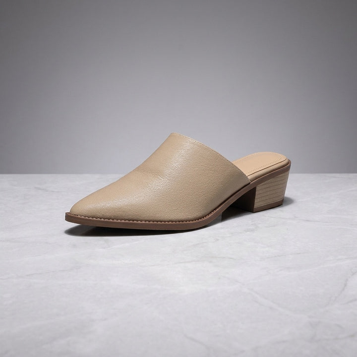 Lucera Leather Mules — Sand, three-quarter studio view