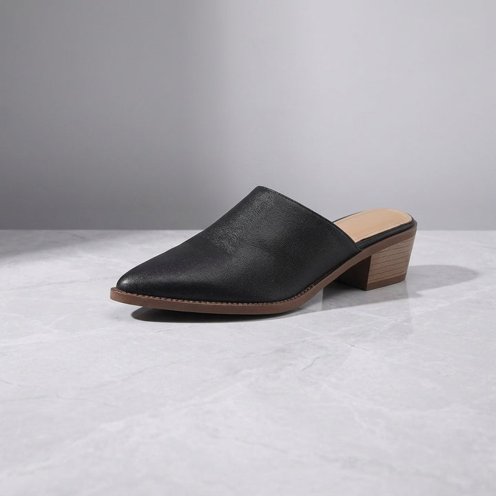 Lucera Leather Mules — Black, three-quarter studio view