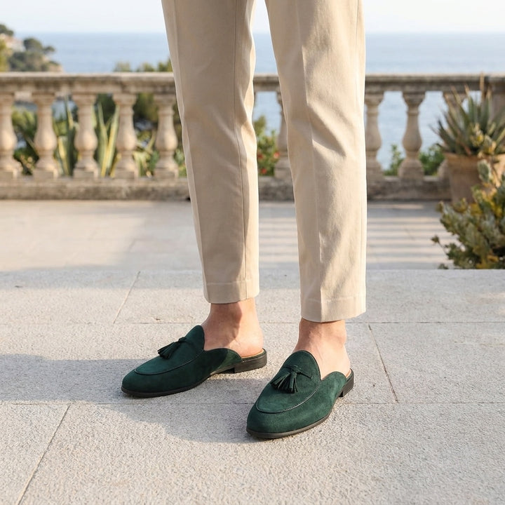 Vasto Suede Mules — Dark Green, male model knee-down coastal terrace