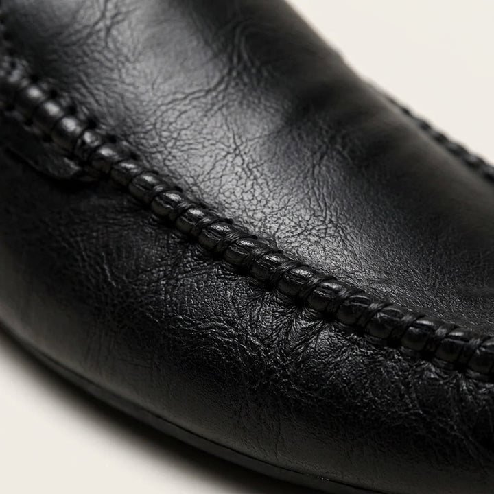 Vietri Leather Mules — Black, close-up of hand-stitched moccasin seam