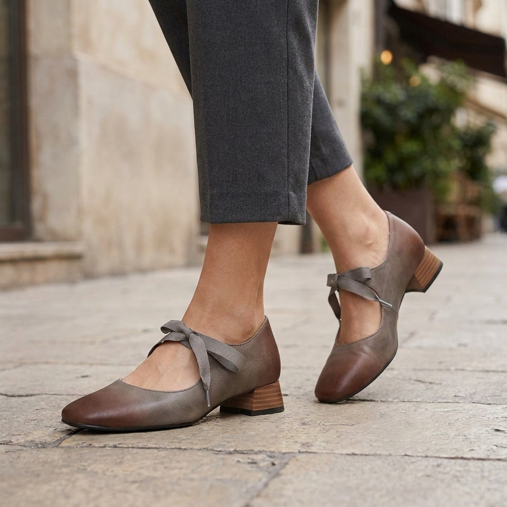 Nemi Square Mary Janes — Gray, on model urban cafe sidewalk