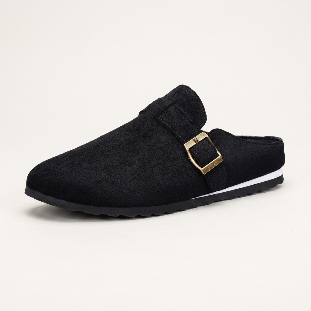 Volterra Suede Mules — Black, three-quarter studio view