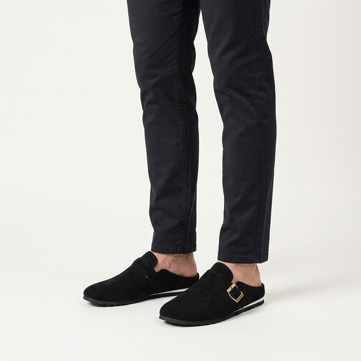 Volterra Suede Mules — Black, worn on model, studio