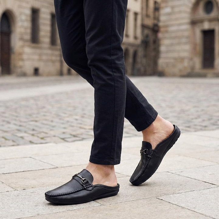 Murano Leather Mules — Black, three-quarter open-back studio view