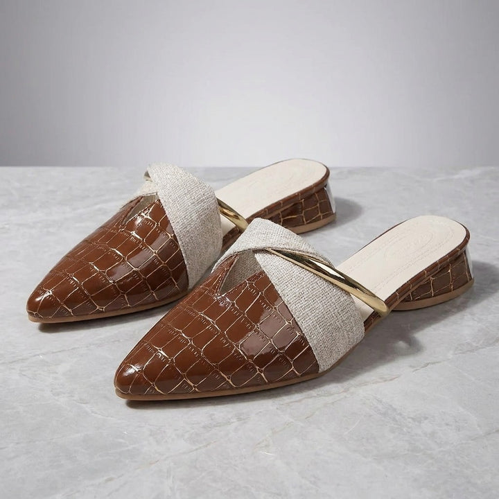 Tivoli Croc-Embossed Mules — Khaki, pair on marble