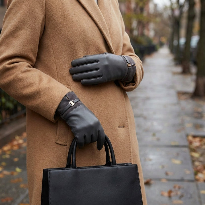 Malcesine Slim Gloves — Charcoal, worn with a camel coat on an autumn street