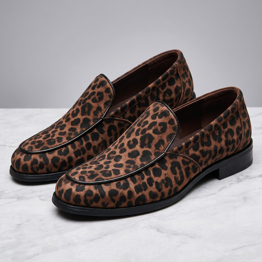 Mantova Suede Loafers — Brown Leopard, pair in three-quarter view on light-grey marble