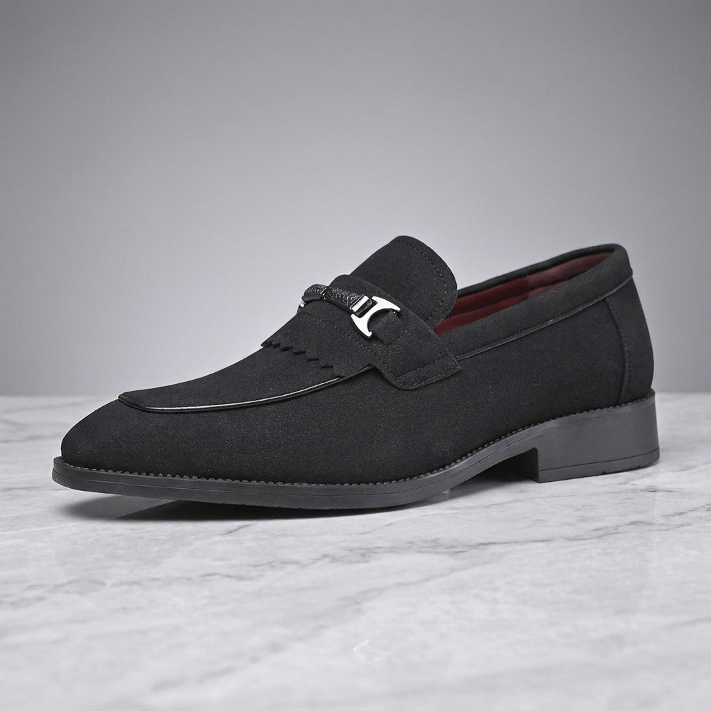 Modica Kiltie Bit Loafers — Black suede, single loafer in side profile on light grey marble
