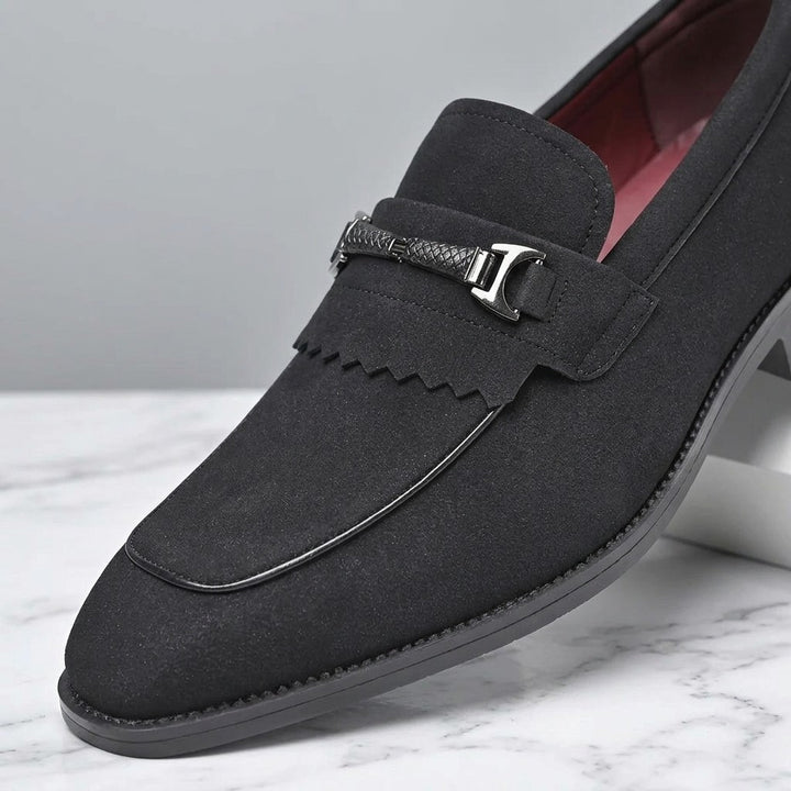 Modica Kiltie Bit Loafers — Black suede, close-up of the silver-tone bit, fringed kiltie and almond toe