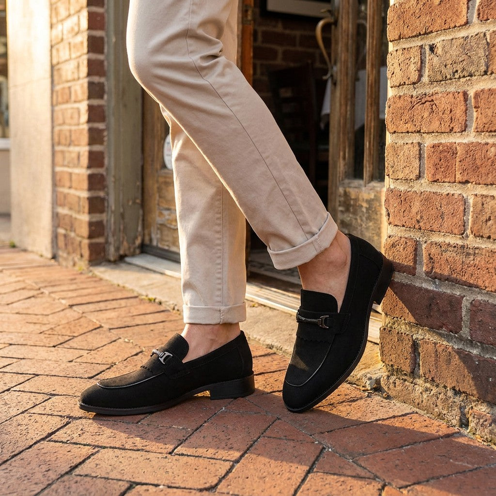 Modica Kiltie Bit Loafers — Black suede, worn with cuffed stone chinos on a brick sidewalk