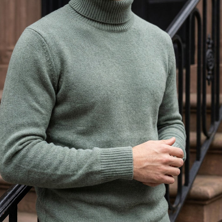 Pistoia Merino Wool Turtleneck — Sage, worn close-up of the cuff and knit