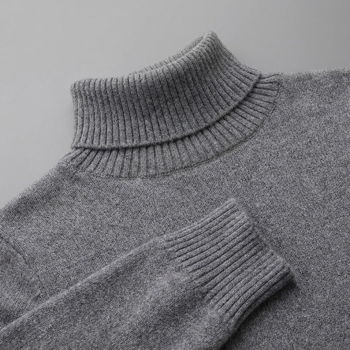 Pistoia Merino Wool Turtleneck — Charcoal, close-up of the ribbed collar, knit and cuff