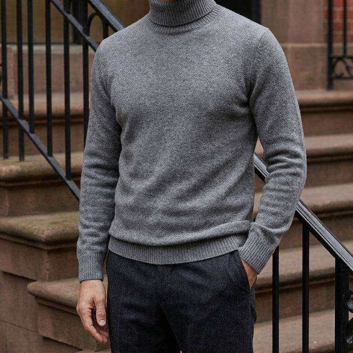 Pistoia Merino Wool Turtleneck — Charcoal, worn on a brownstone stoop