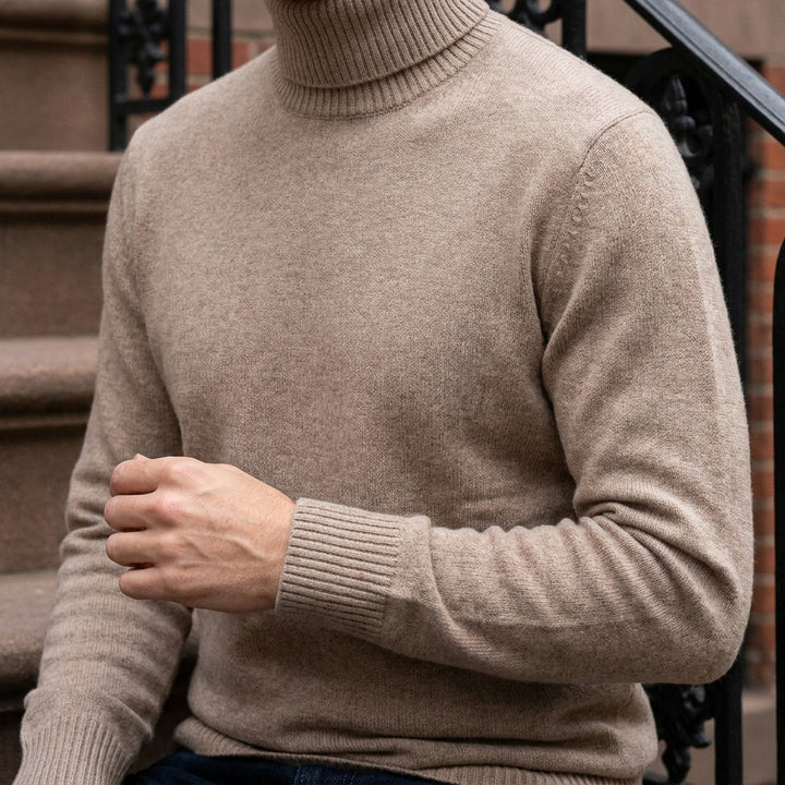 Pistoia Merino Wool Turtleneck — Camel, worn close-up of the cuff and knit