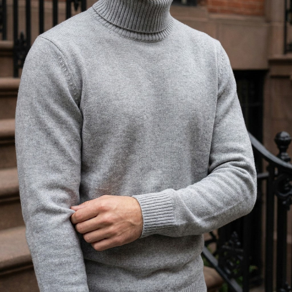 Pistoia Merino Wool Turtleneck — Light Grey, worn close-up of the cuff and knit