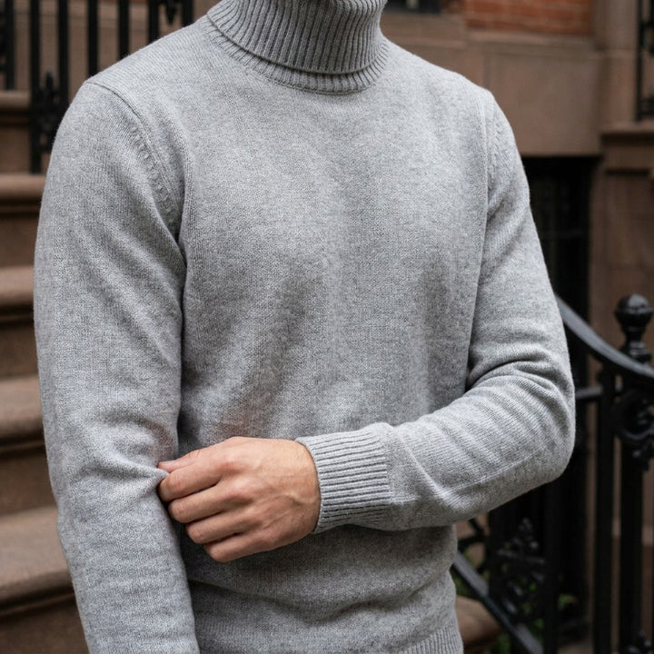 Pistoia Merino Wool Turtleneck — Light Grey, worn close-up of the cuff and knit