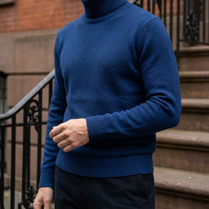 Pistoia Merino Wool Turtleneck — Royal Blue, worn close-up of the cuff and knit
