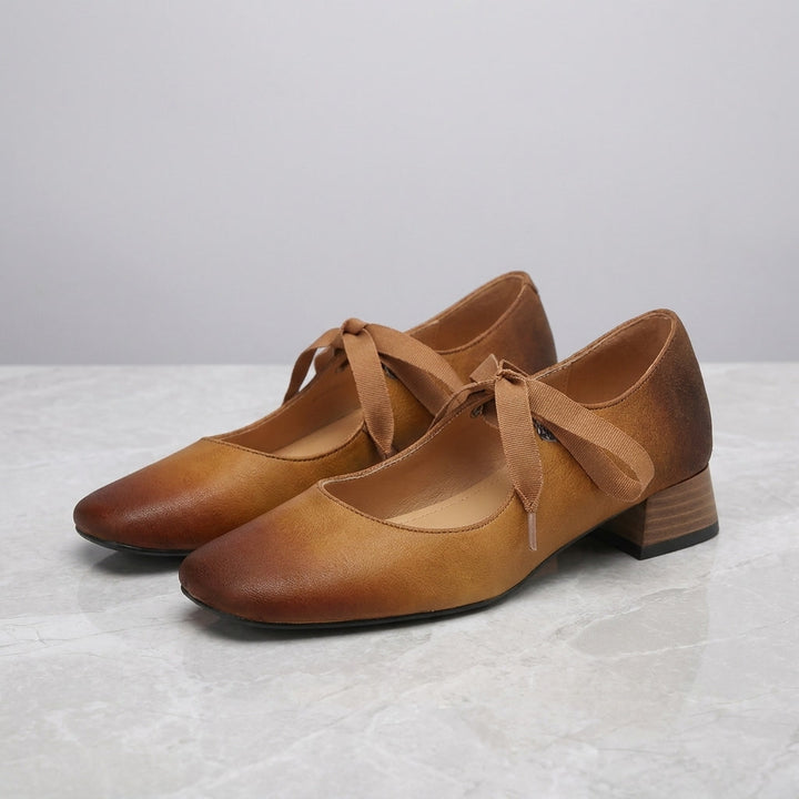 Nemi Square Mary Janes — Yellow Brown, pair on marble